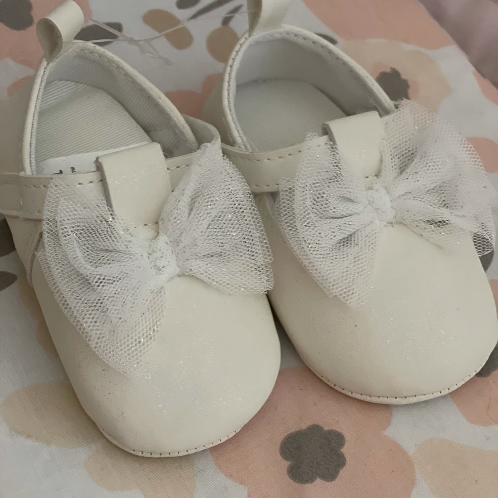 White baby shoes - New
